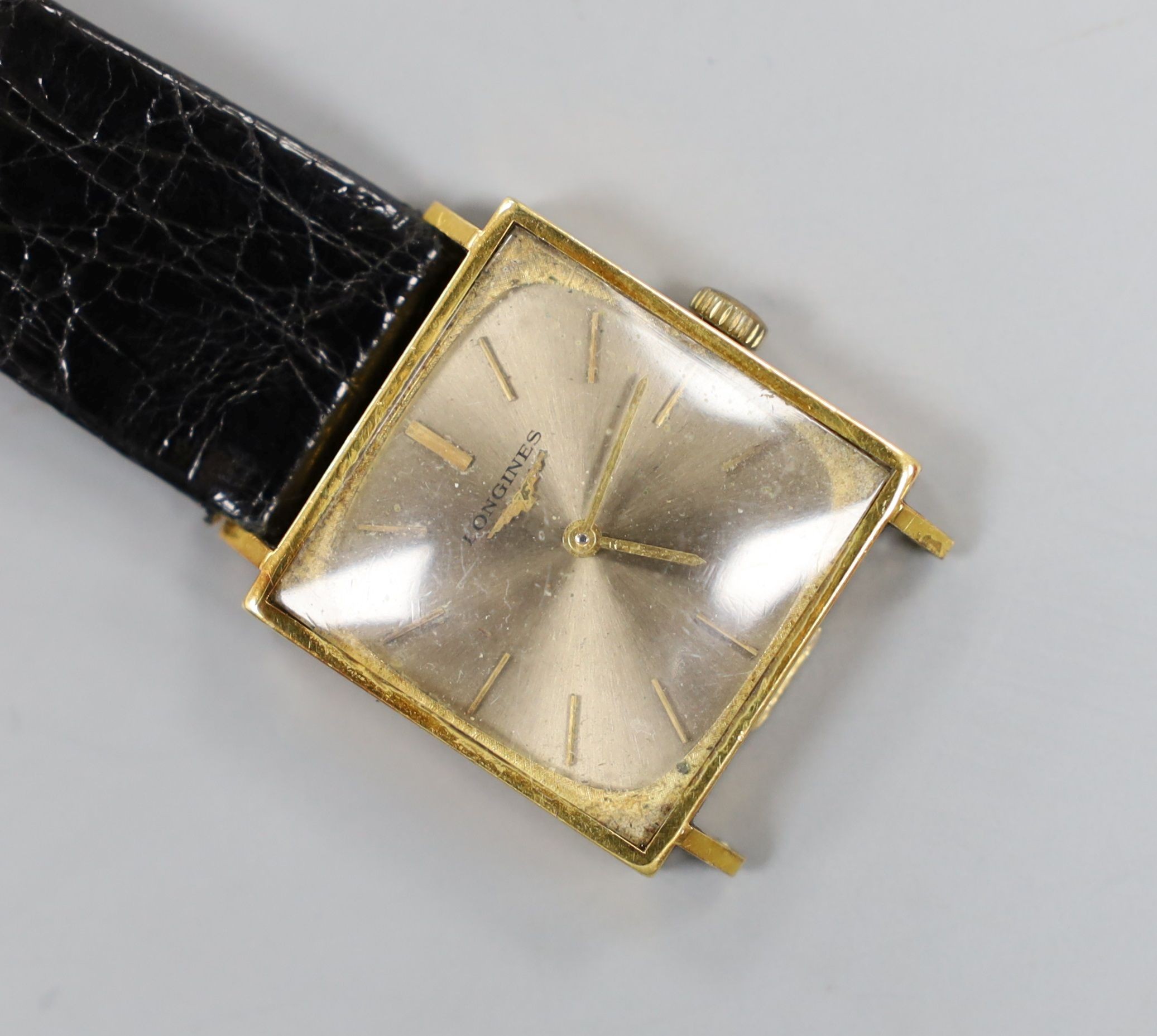 A gentleman's 1960's 18ct gold Longines manual wind dress wrist watch (part of strap missing), gross weight 22.5 grams.